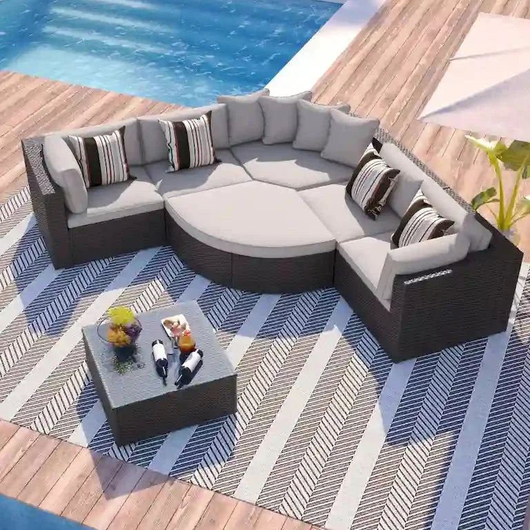Salon de jardin 7 pièces en résine tressée, coussins gris et table en verre Merrelo™
